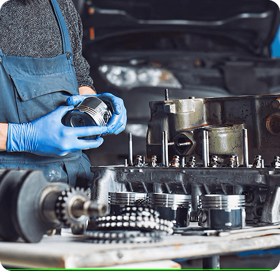 Mechanic handling engine parts